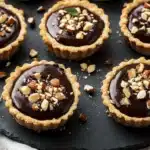 Mini Dark Chocolate Hazelnut Tartlets First Image First Image